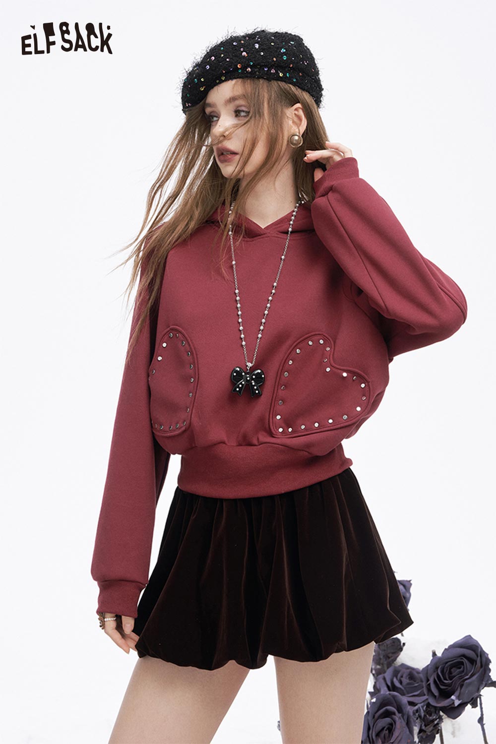 ELFSACK heart patchwork hooded sweatshirt in maroon with decorative heart designs and studs