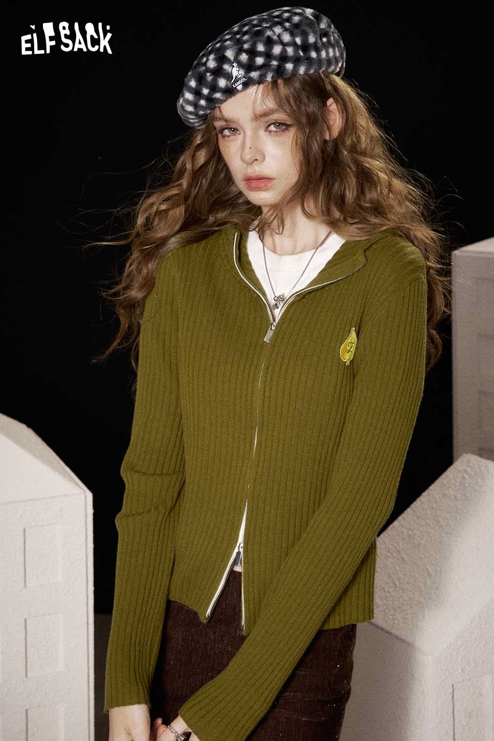 ELFSACK heart print knit sweater in olive green, featuring a stylish zip-up design and ribbed texture
