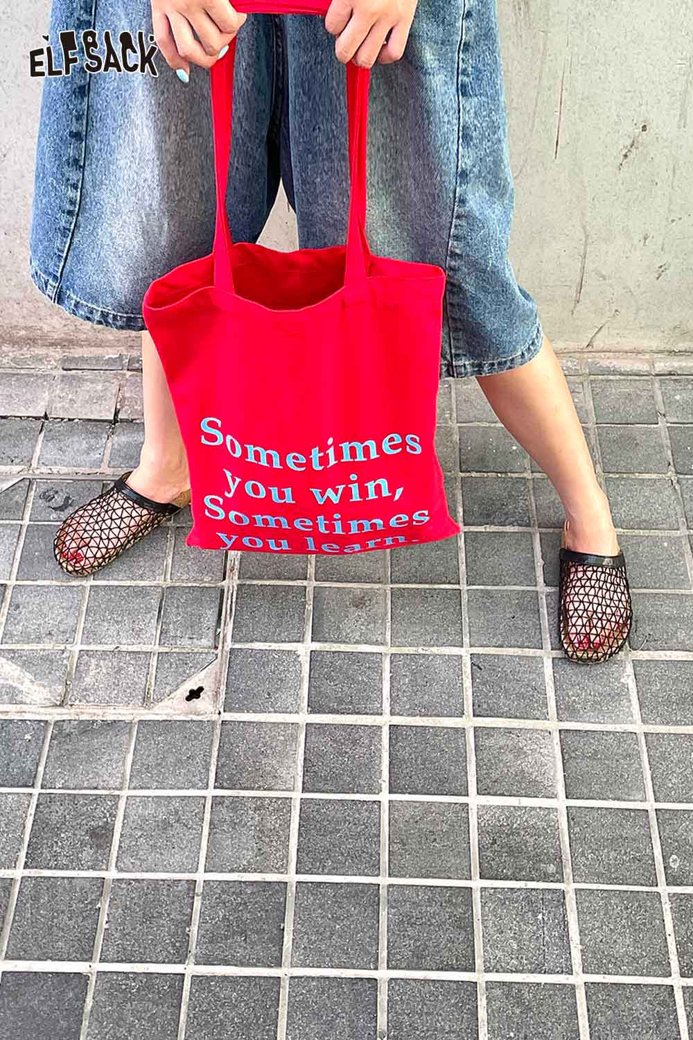 Bright red heavy duty canvas tote bag with motivational quote for shopping and daily use