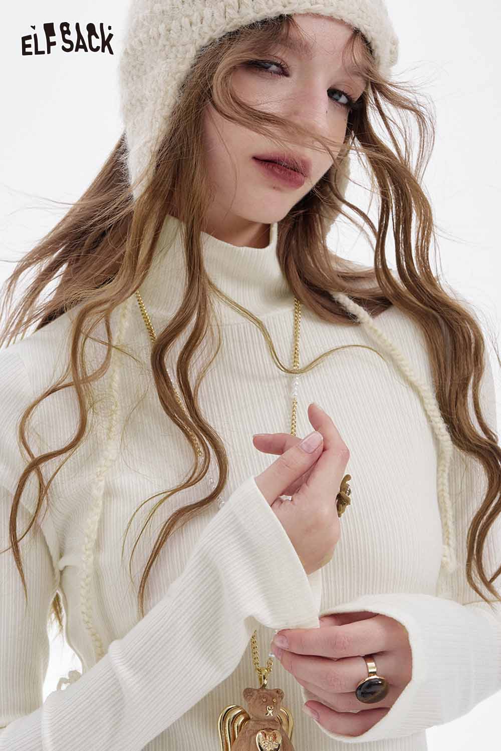 ELFSACK high neck flounce hem t-shirt in white, featuring a stylish design and ribbed fabric.