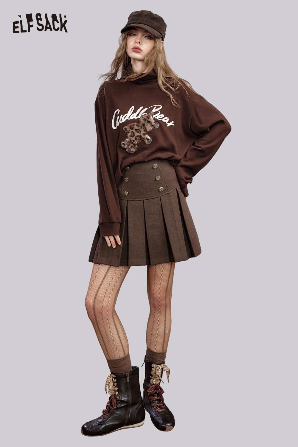 ELFSACK high-rise button front pleated skirt styled with oversized sweater and chic tights