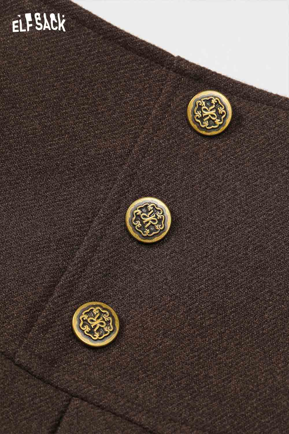 Close-up of ELFSACK high-rise button front pleated skirt showcasing decorative gold buttons