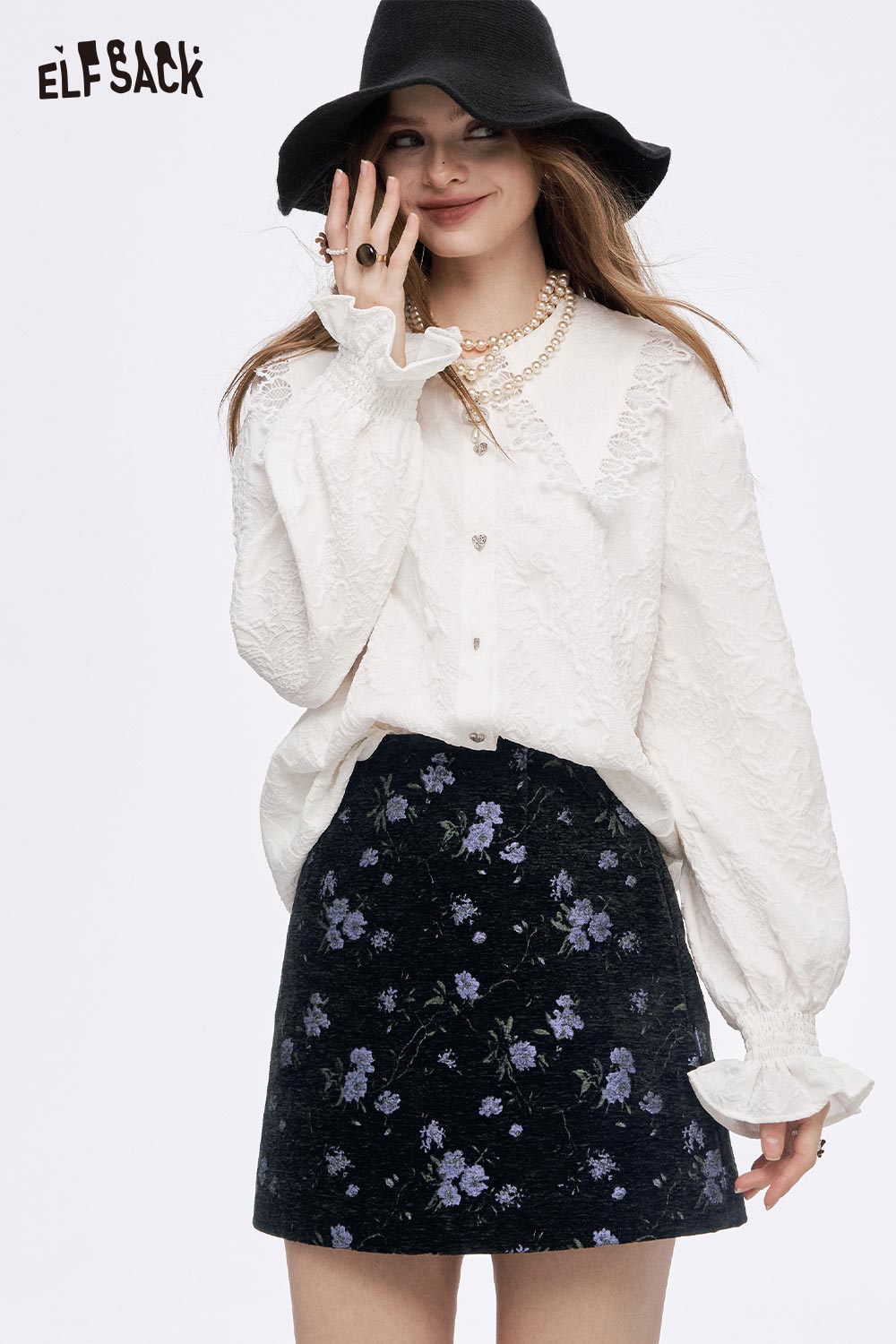 ELFSACK high waist floral A line skirt paired with a white blouse and stylish hat