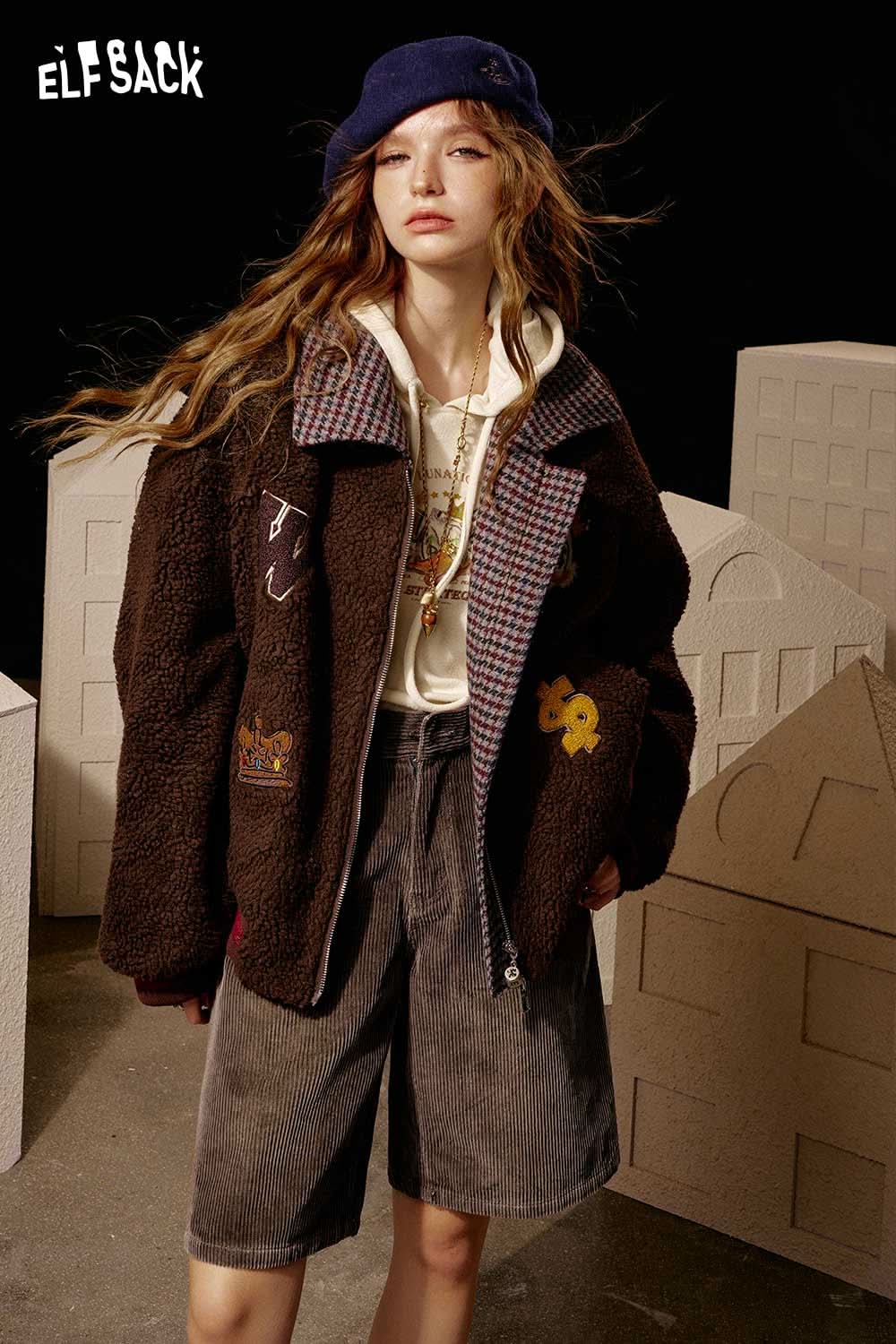 ELFSACK high waist mid shorts for women in dark fabric, styled with a cozy jacket and accessories