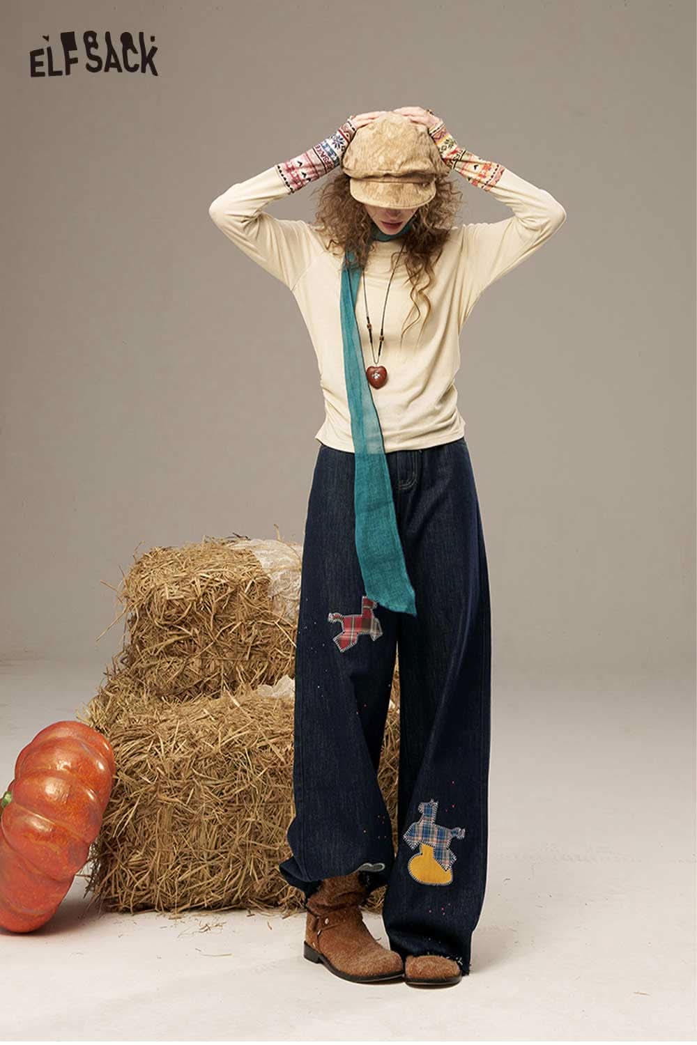 ELFSACK high waisted wide leg denim pants displayed with a styled top and accessories in a rustic setting