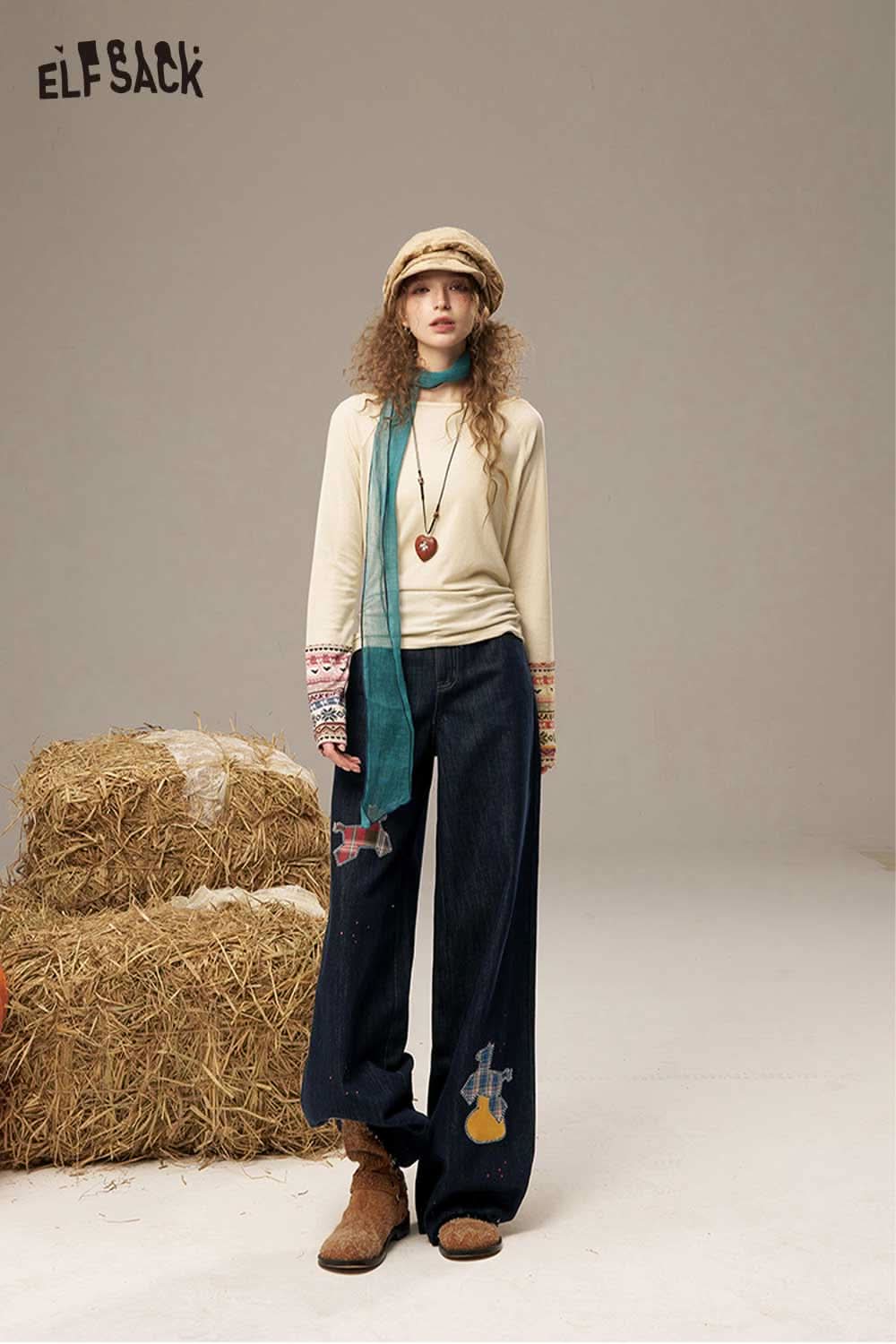 ELFSACK high waisted wide leg denim pants styled with a cream top and accessories