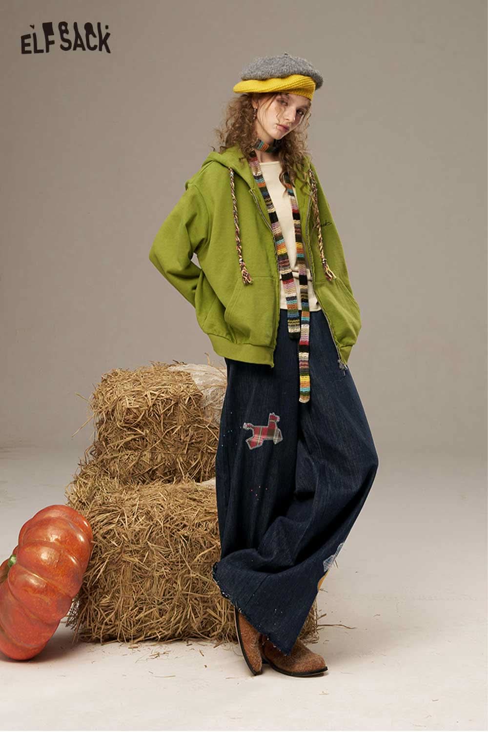 ELFSACK high waisted wide leg denim pants styled with a green jacket and a hat for a trendy look