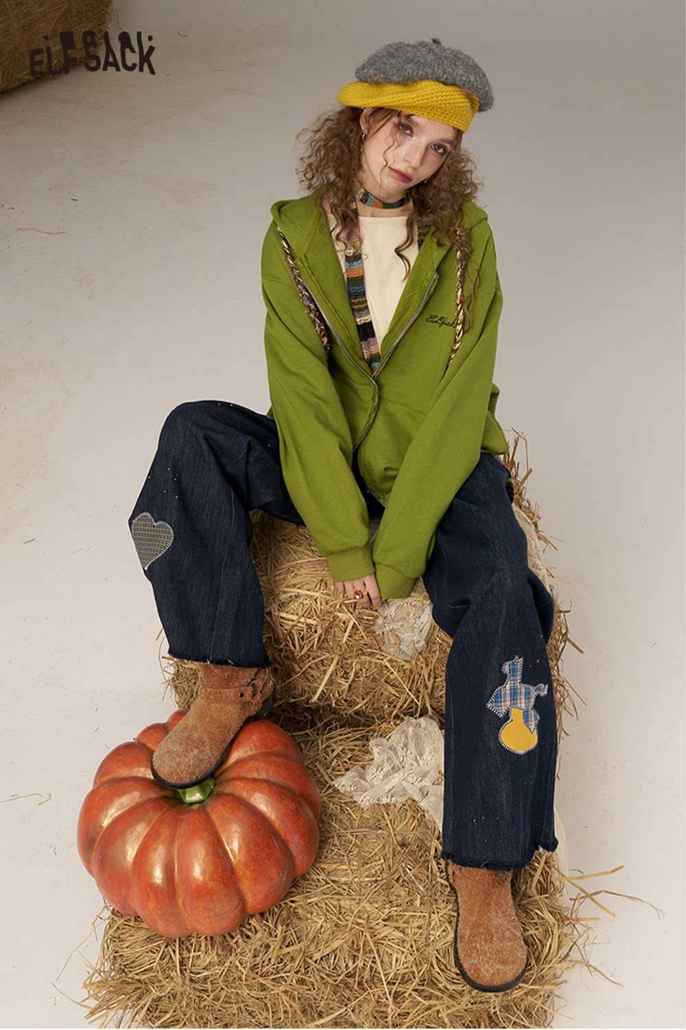 ELFSACK high waisted wide leg denim pants styled with a green hoodie and cozy accessories