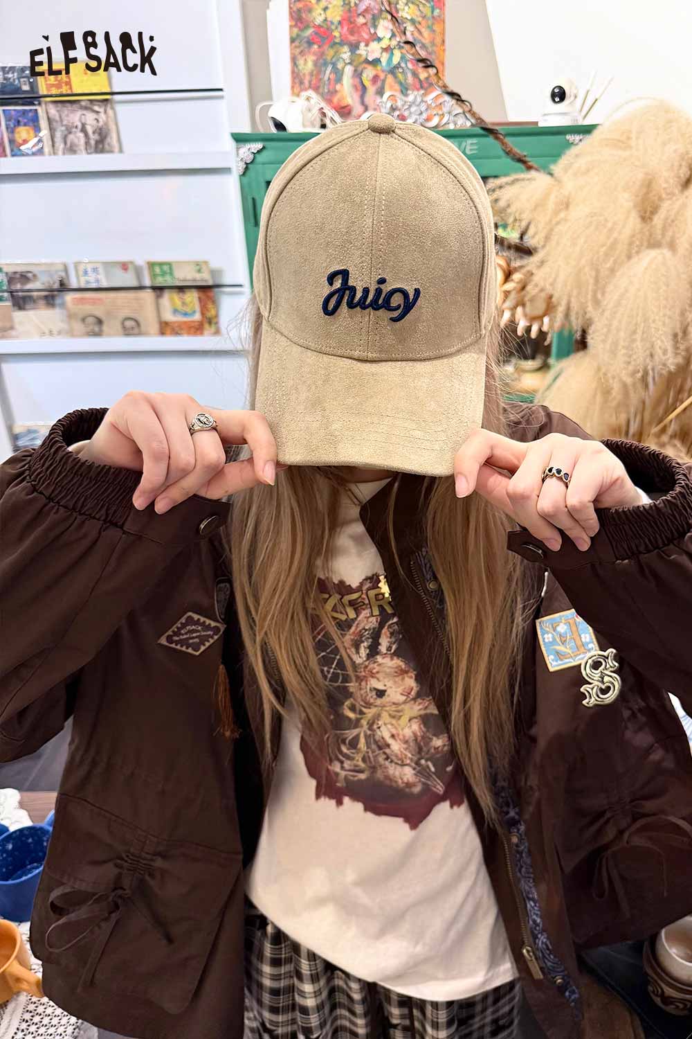 ELFSACK suede baseball cap in tan with 'Juicy' embroidered in blue letters