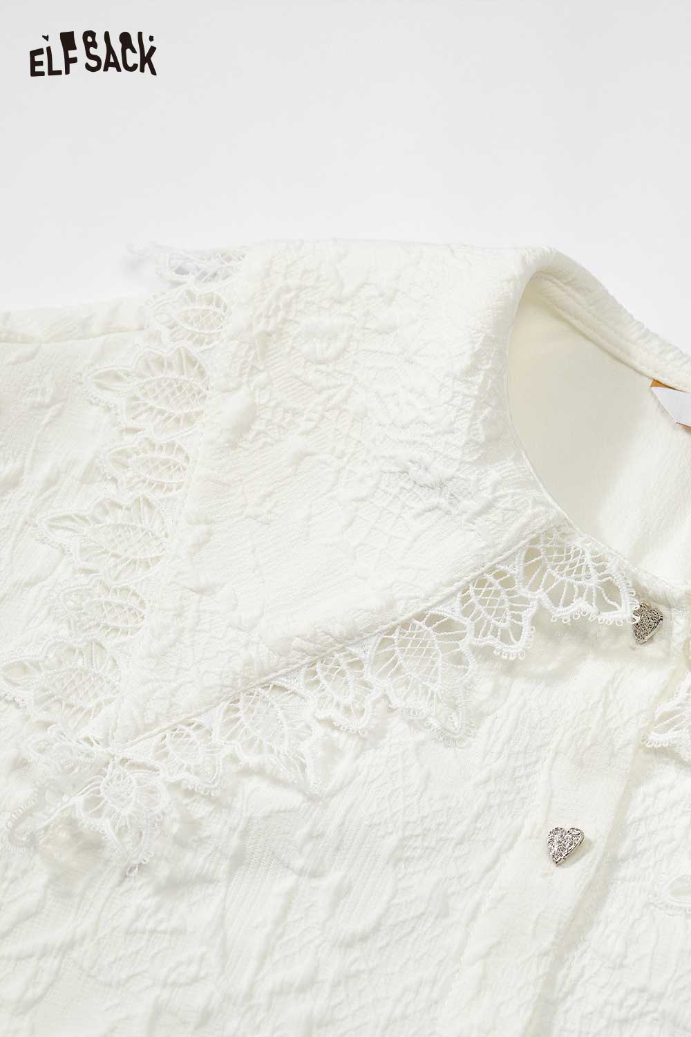 ELFSACK lace lapel collar ruffled cuff shirt in white with delicate lace detailing and heart embellishments