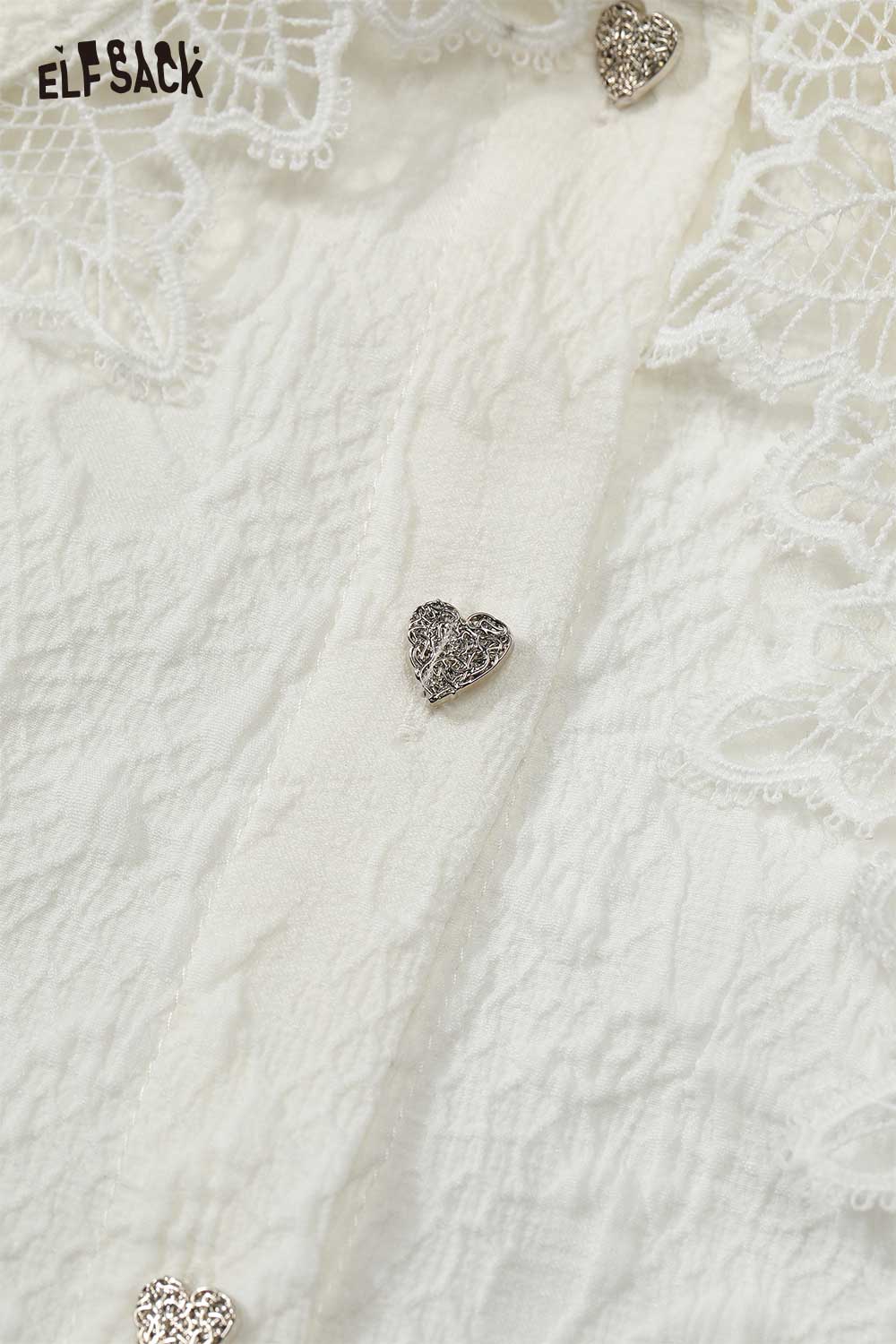 ELFSACK lace lapel collar ruffled cuff shirt in cream with heart-shaped embellishments