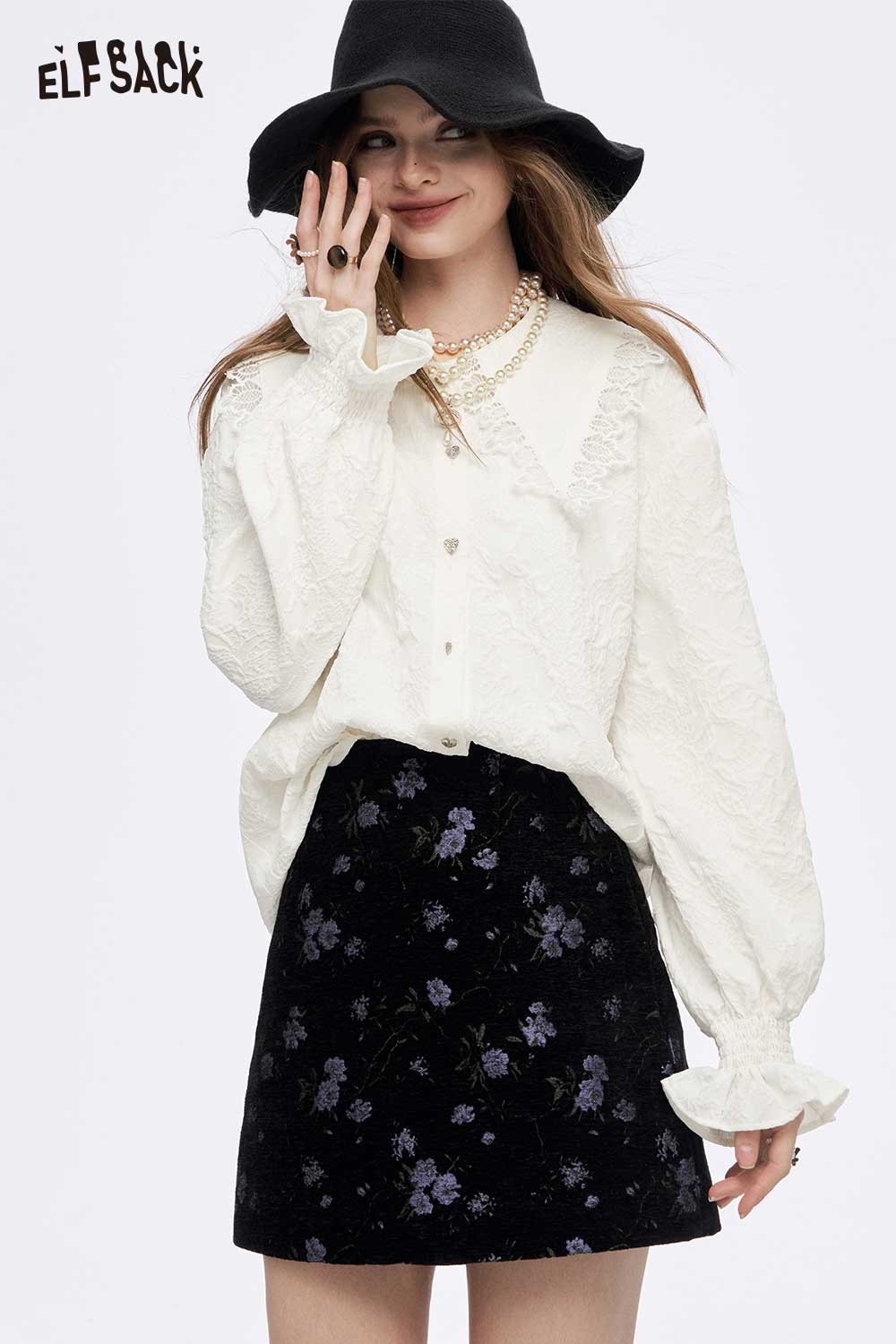 ELFSACK lace lapel collar ruffled cuff shirt in ivory paired with a floral skirt for stylish women