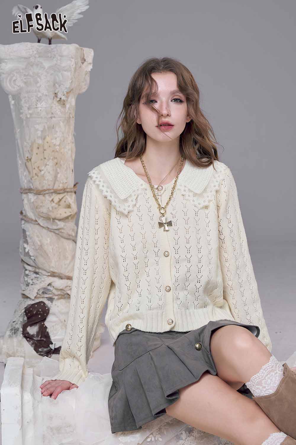 ELFSACK lace panel knit top in cream with a collar and button front, styled with a gray skirt.