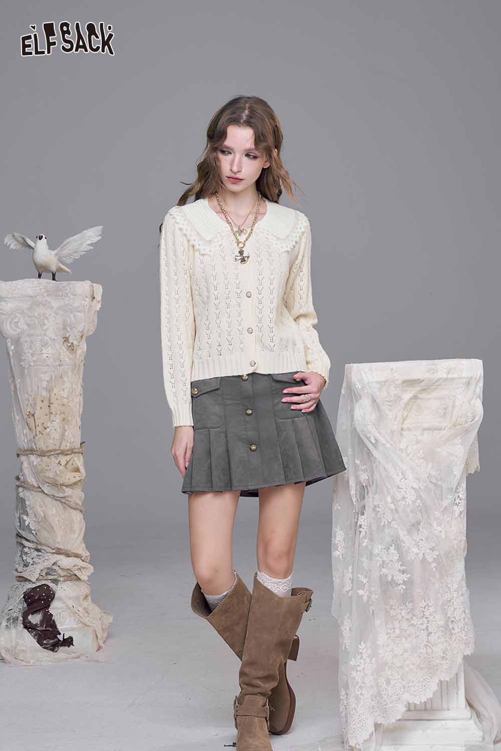 ELFSACK lace panel knit top in cream with vintage cable knit design, paired with a gray skirt