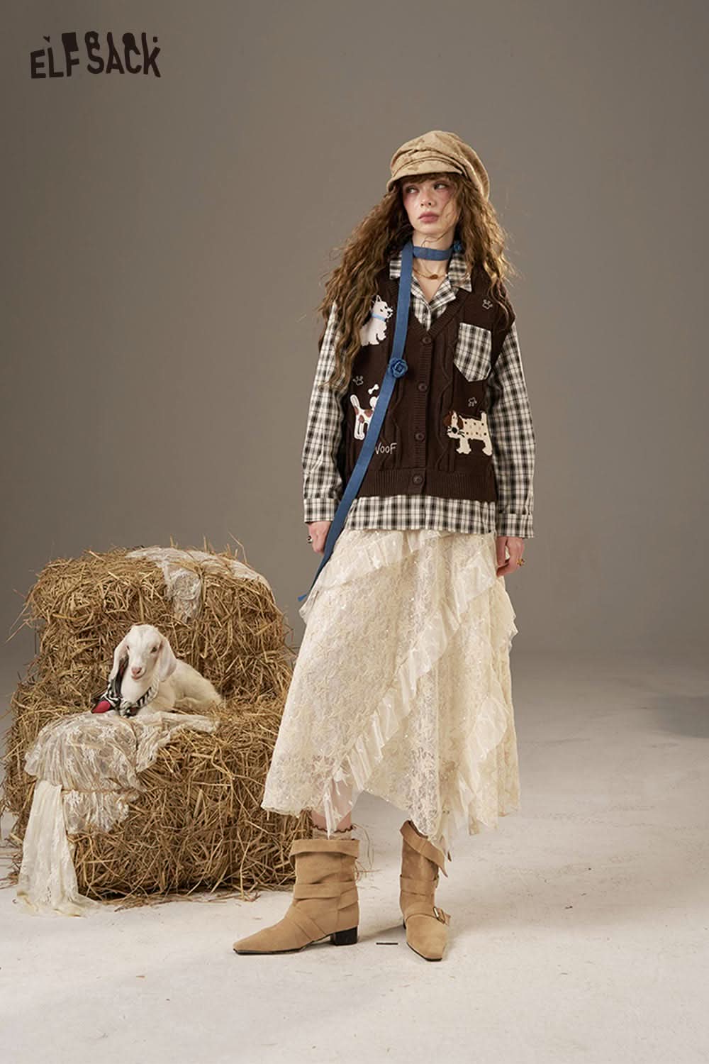 ELFSACK lace patchwork long skirt paired with a stylish top and boots in a rustic setting