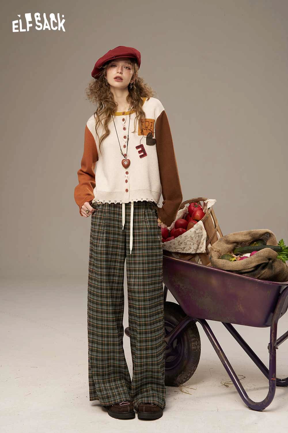 ELFSACK lace plaid straight leg pants styled with a colorful sweater and accessories for a trendy look