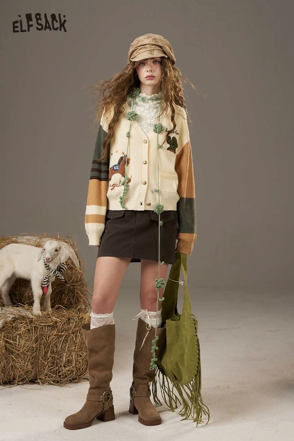 ELFSACK lace slim fit long sleeve shirt paired with a colorful cardigan and stylish knee-high boots