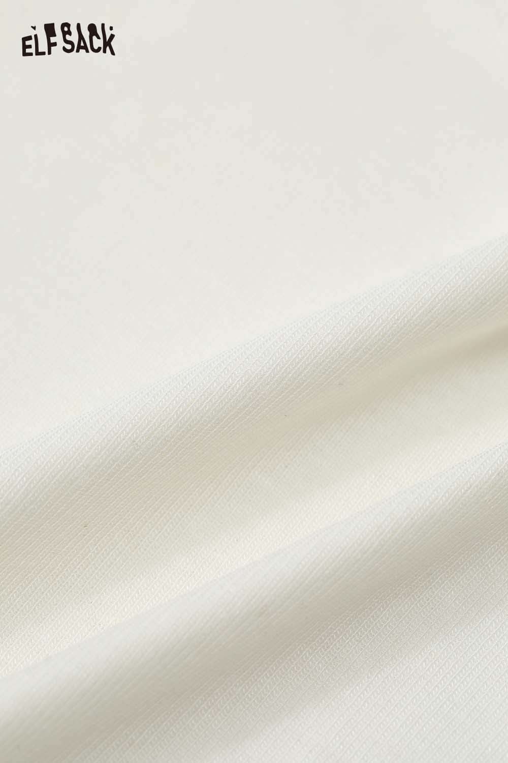 Close-up of soft fabric showcasing the lace trim fitted tee for women by ELFSACK in a neutral color