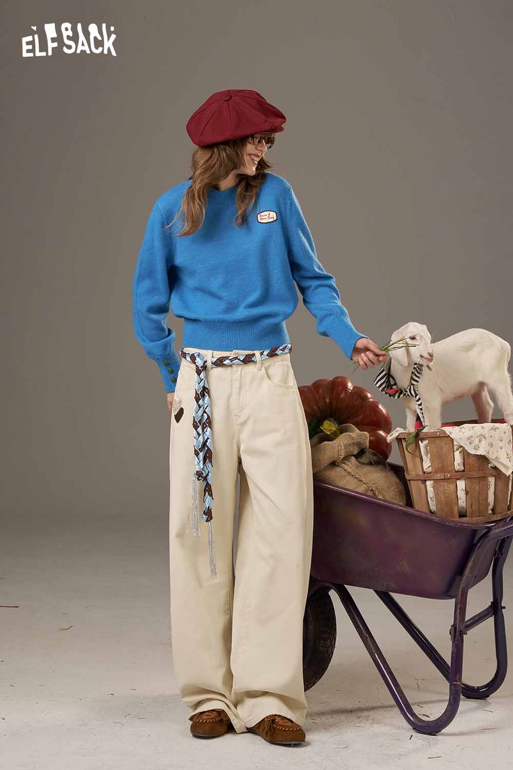 ELFSACK blue lantern sleeve fitted knitted sweater styled with wide-leg pants for a chic look
