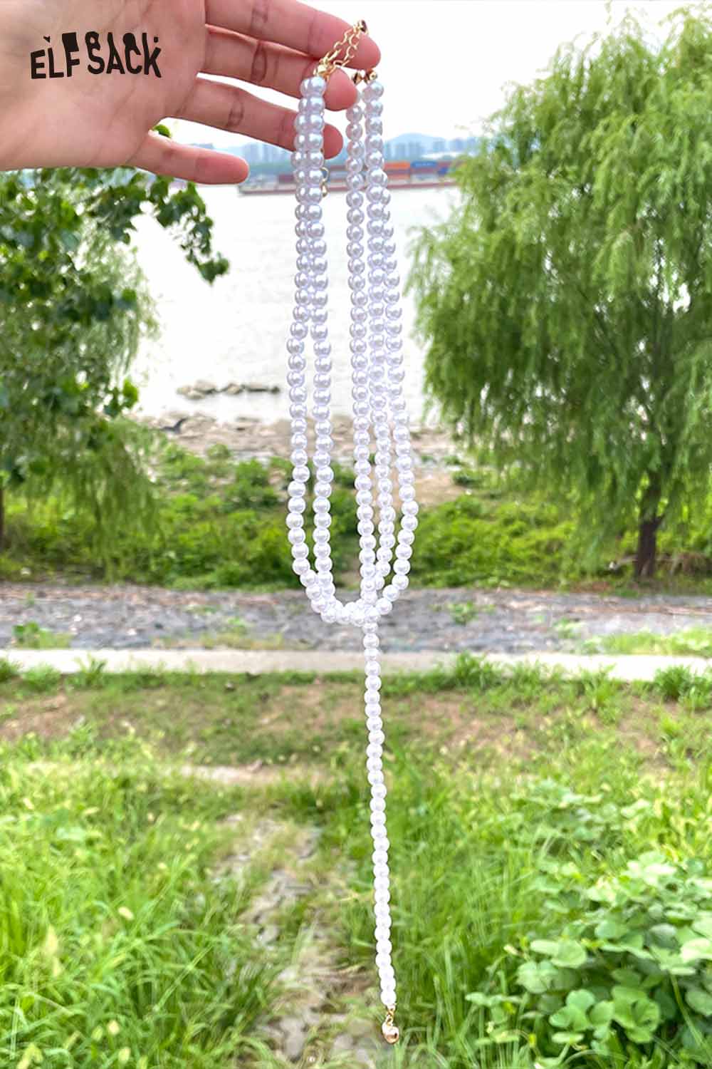 Layered pearl choker necklace by ELFSACK featuring multiple strands for a stylish look