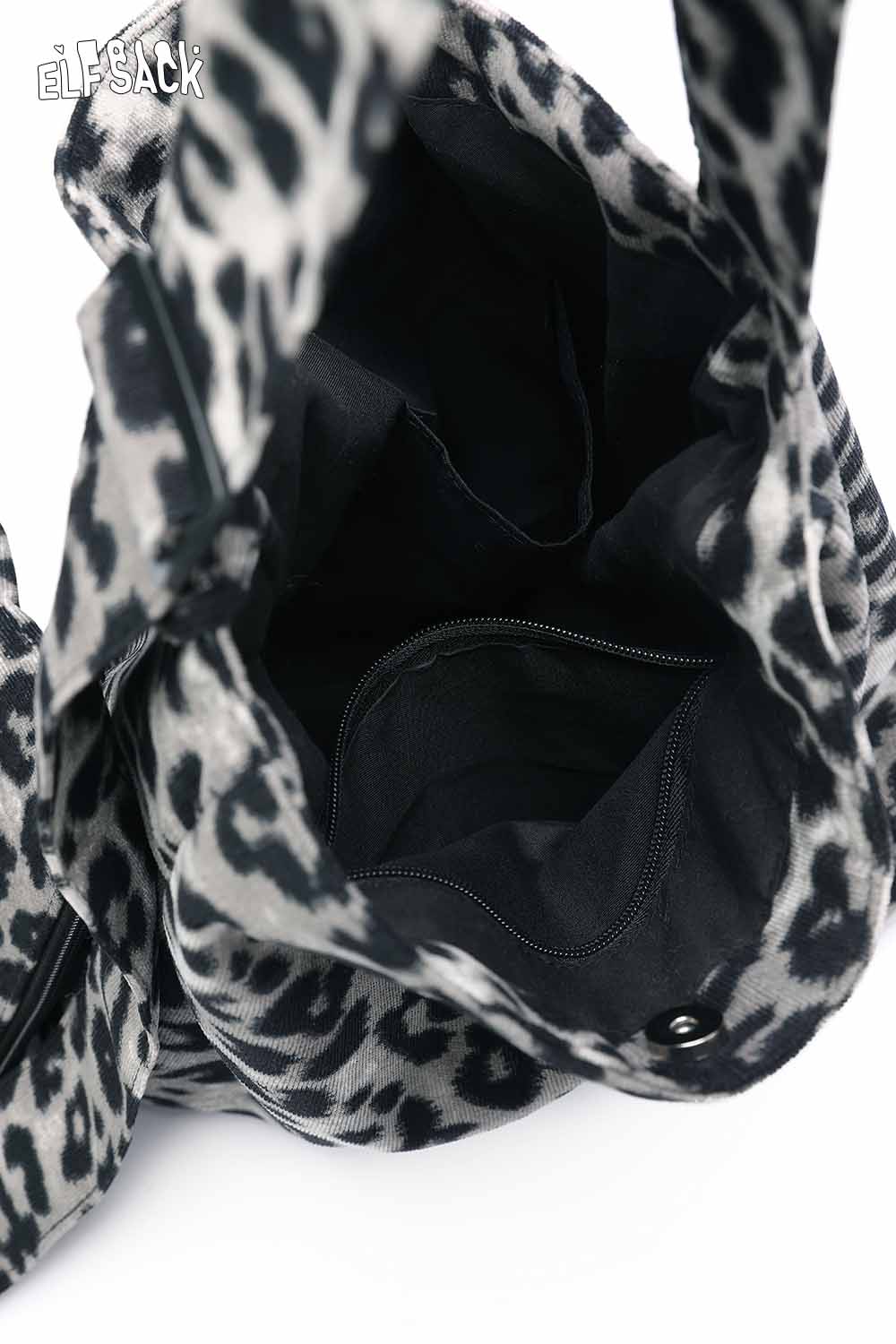Leopard print canvas tote bag featuring spacious interior and multiple pockets for easy organization
