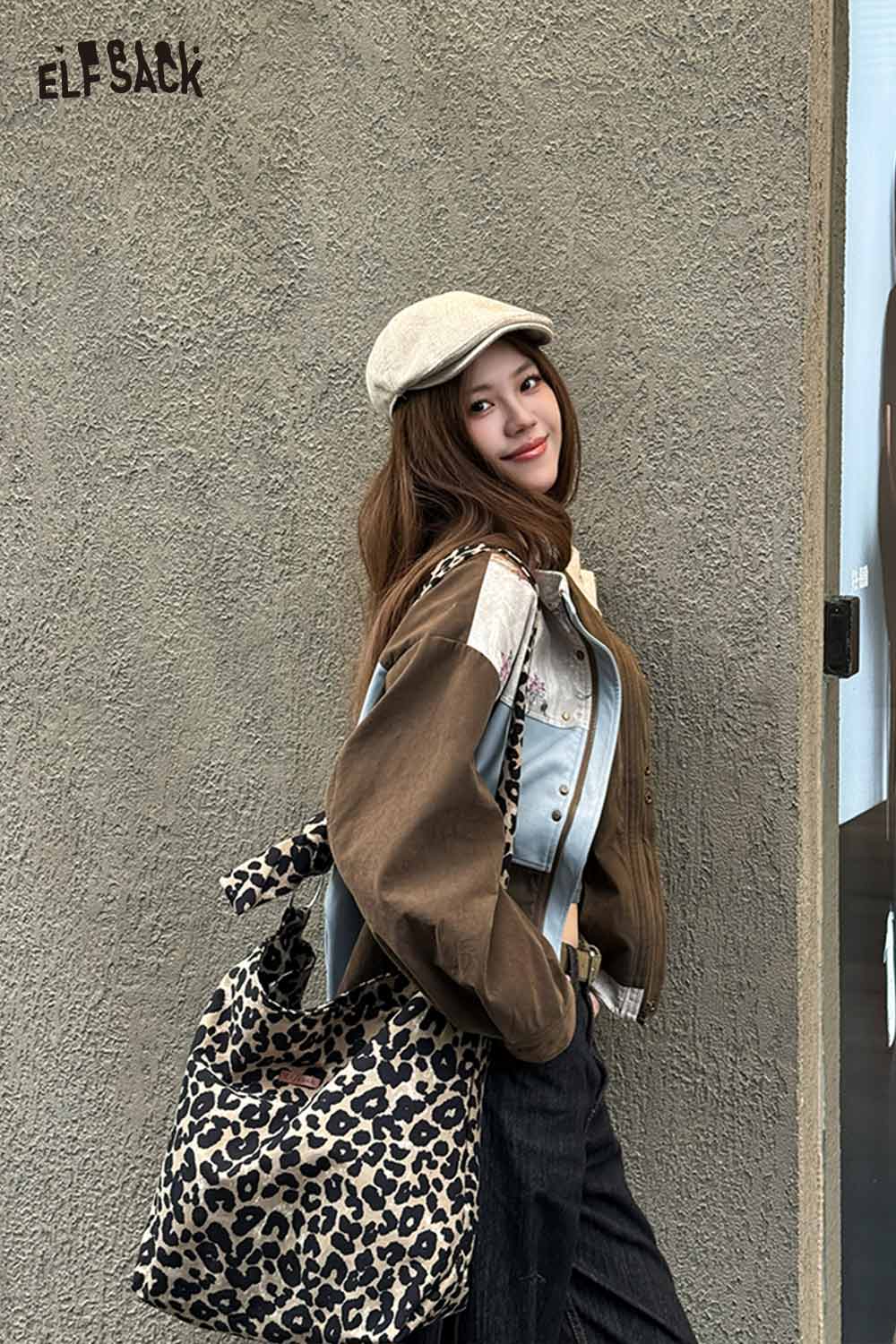 ELFSACK leopard print crossbody bag styled with a trendy outfit on a city street