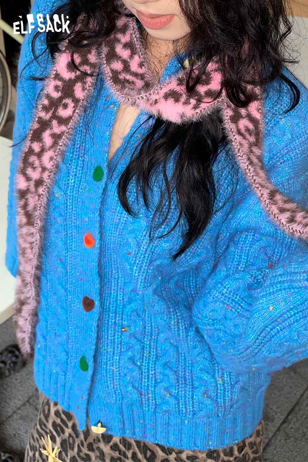 ELFSACK leopard print fuzzy scarf styled with a colorful knit cardigan for a trendy look