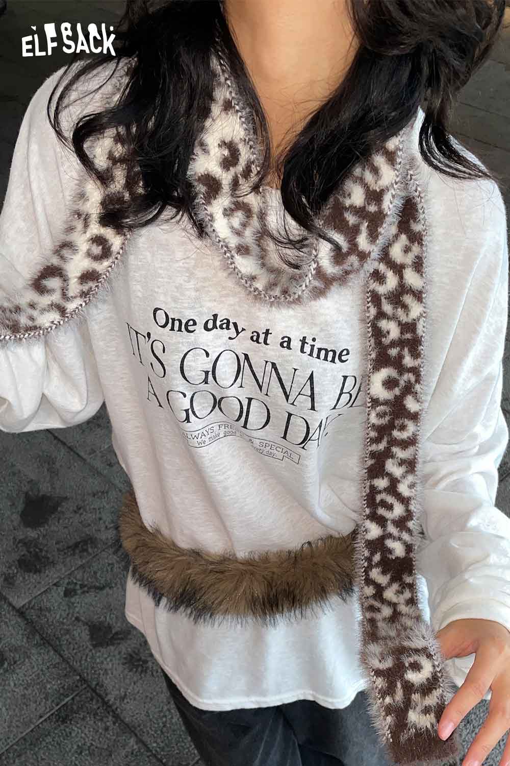 ELFSACK leopard print fuzzy scarf styled with a casual gray long sleeve shirt