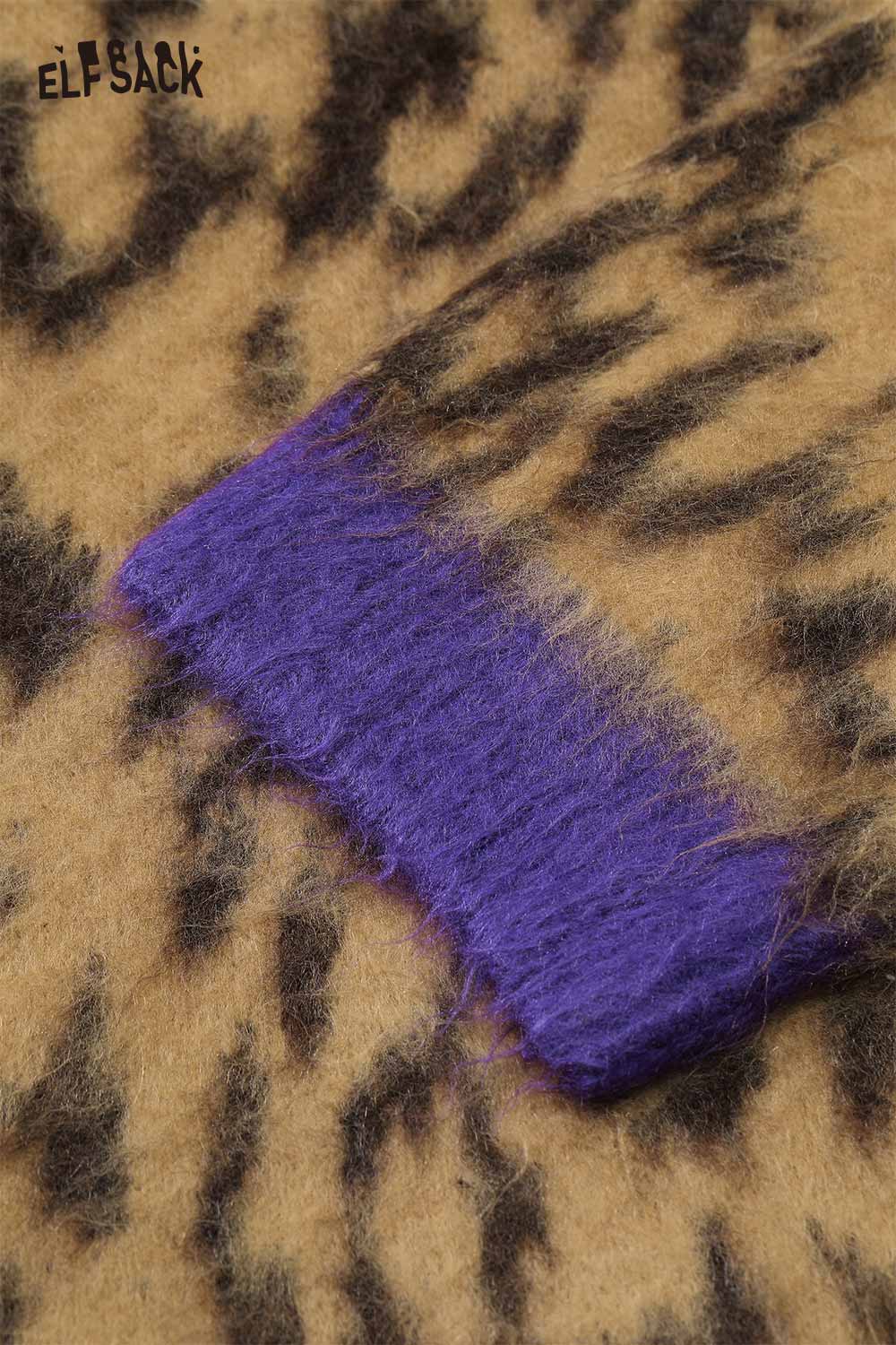 Close-up of ELFSACK leopard print oversized sweater showcasing vibrant purple cuff detail