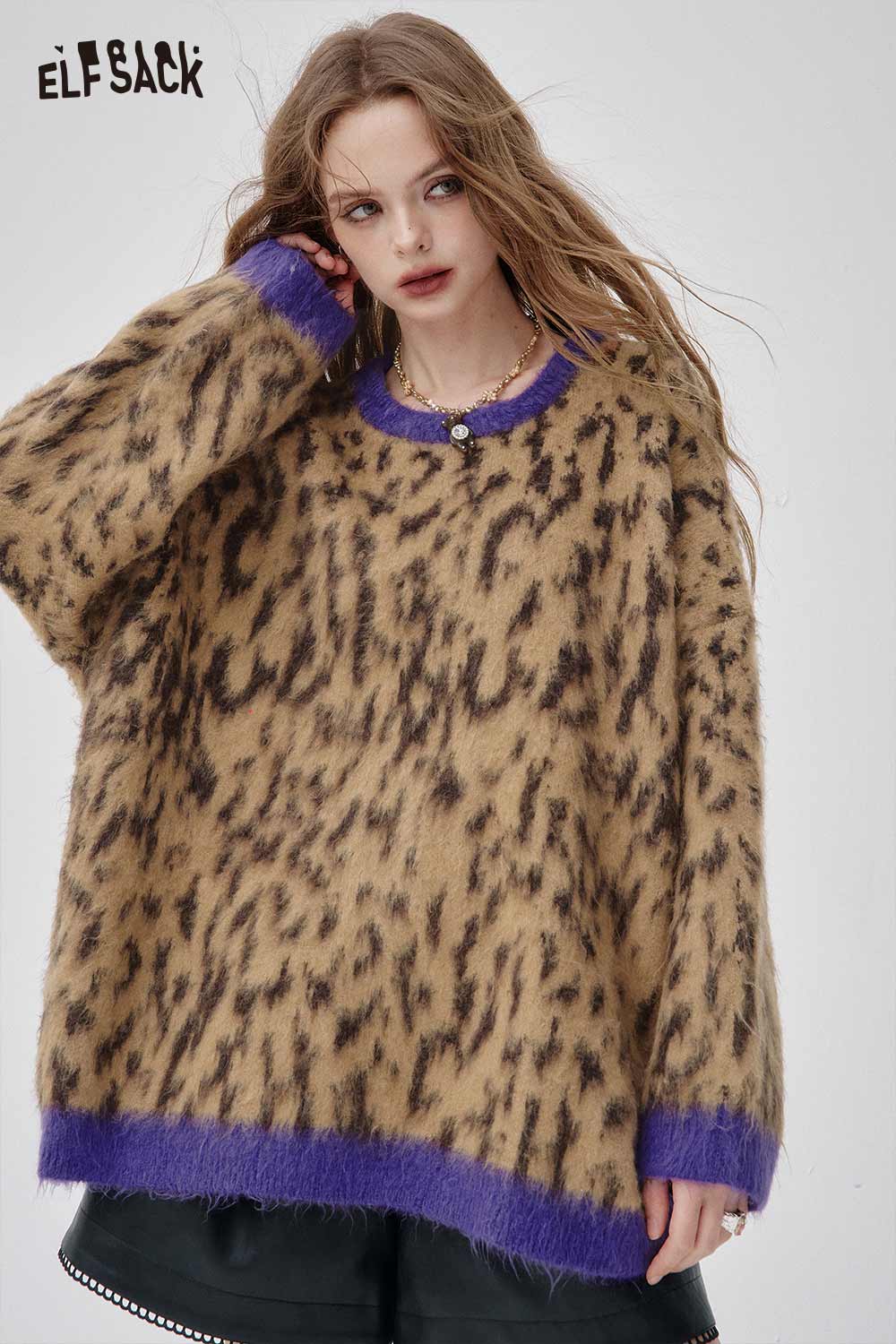 Leopard print oversized sweater by ELFSACK with purple accents and a cozy design for stylish comfort