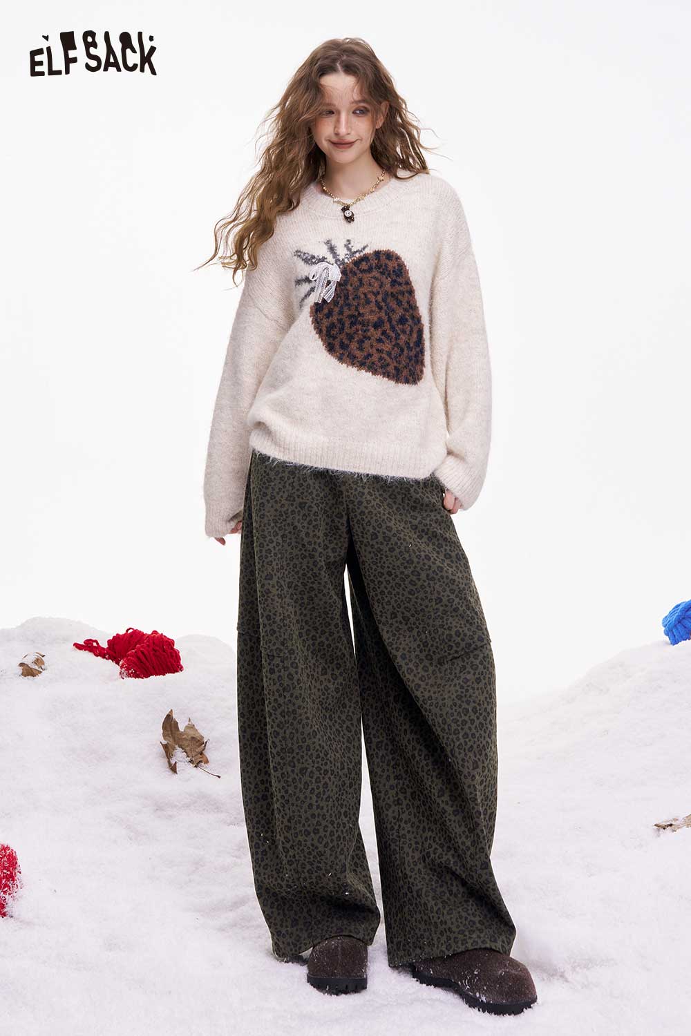 ELFSACK leopard print wide leg pants paired with a cozy sweater for a stylish winter outfit