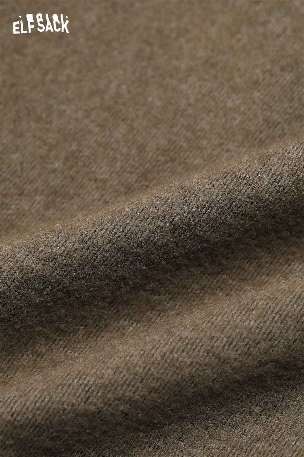 Soft fabric texture of ELFSACK leopard print wide leg pants showcasing rich hues and cozy material