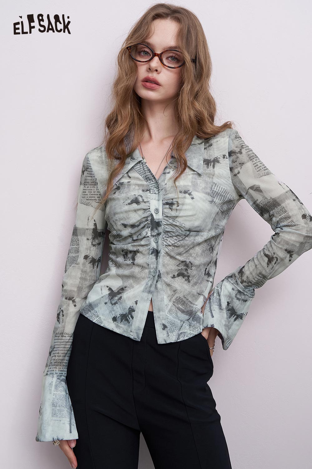 ELFSACK women's graphic pleated shirt with faded newspaper print, ruched front and flared cuffs