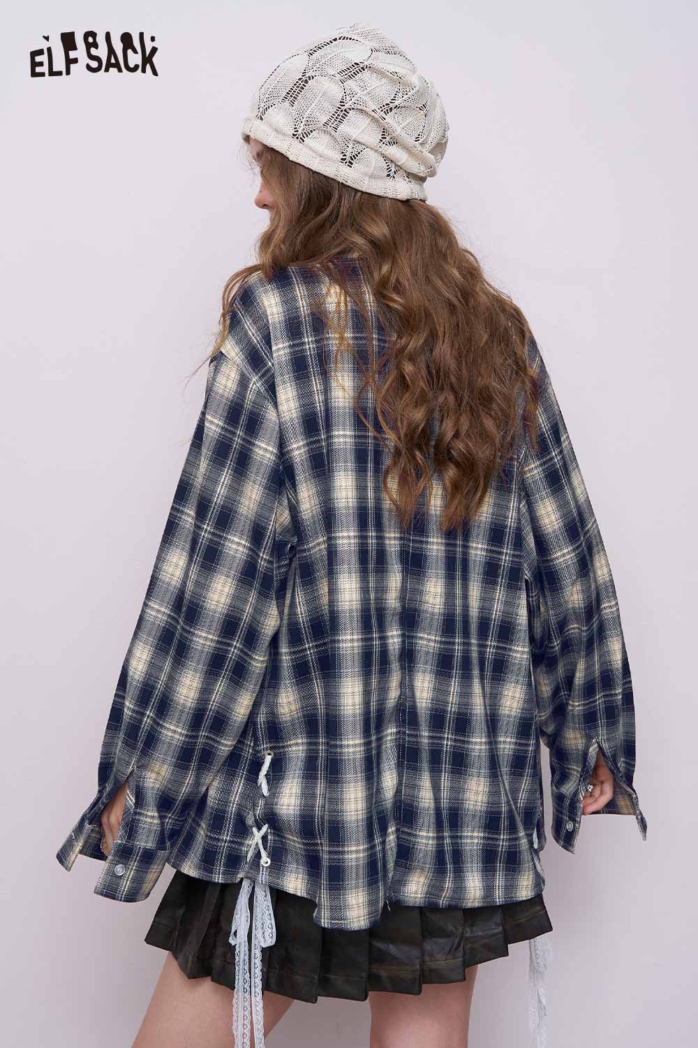ELFSACK back view of model in women's dark blue plaid graphic shirt oversized with lace side ties