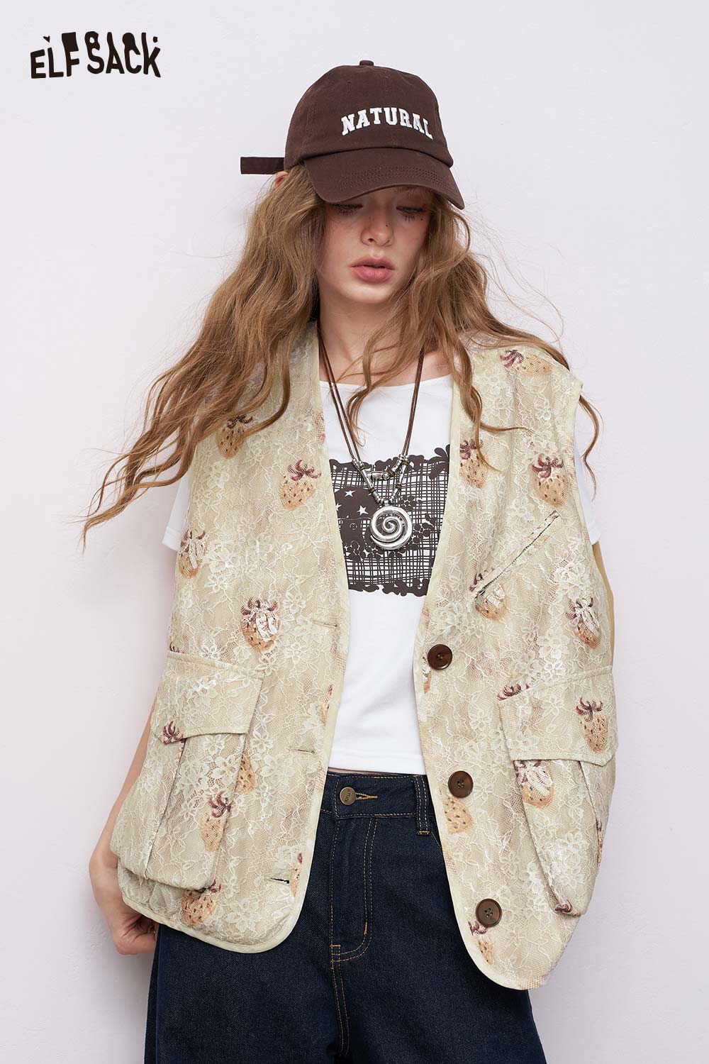 ELFSACK oversized beige floral women's graphic lace vest with large buttons and patch pockets styled over tee