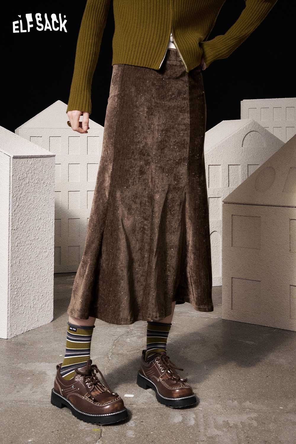 ELFSACK light slim fit bodycon skirt in brown with a flared bottom, styled with a green cardigan