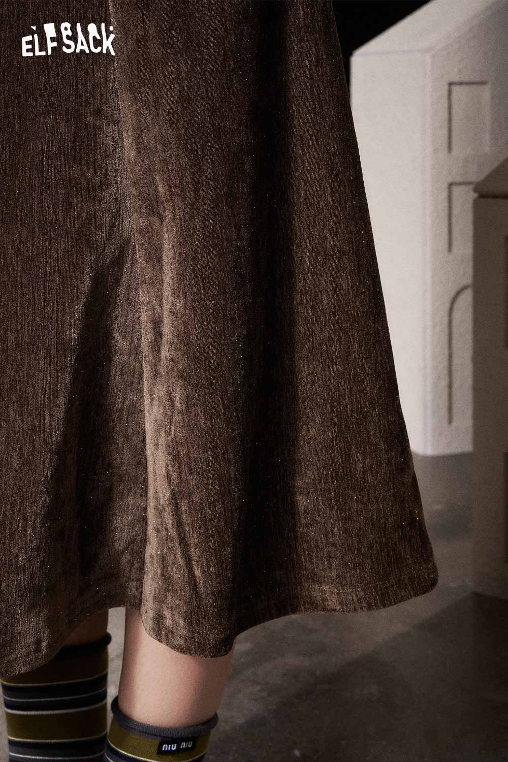 ELFSACK Light slim fit bodycon skirt in brown fabric with stylish hem for modern fashion lovers