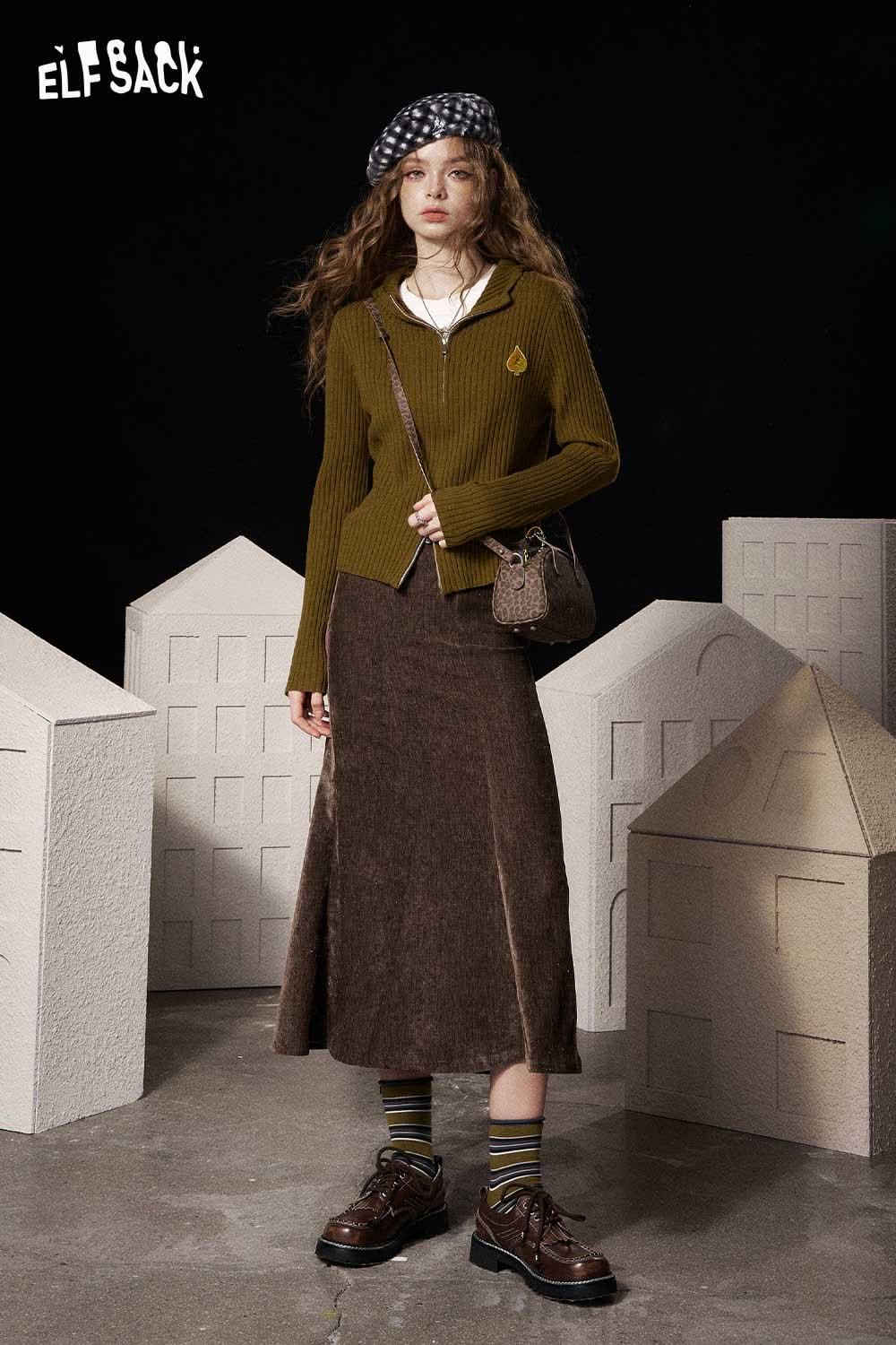 ELFSACK light slim fit bodycon skirt in brown paired with a green sweater and stylish accessories