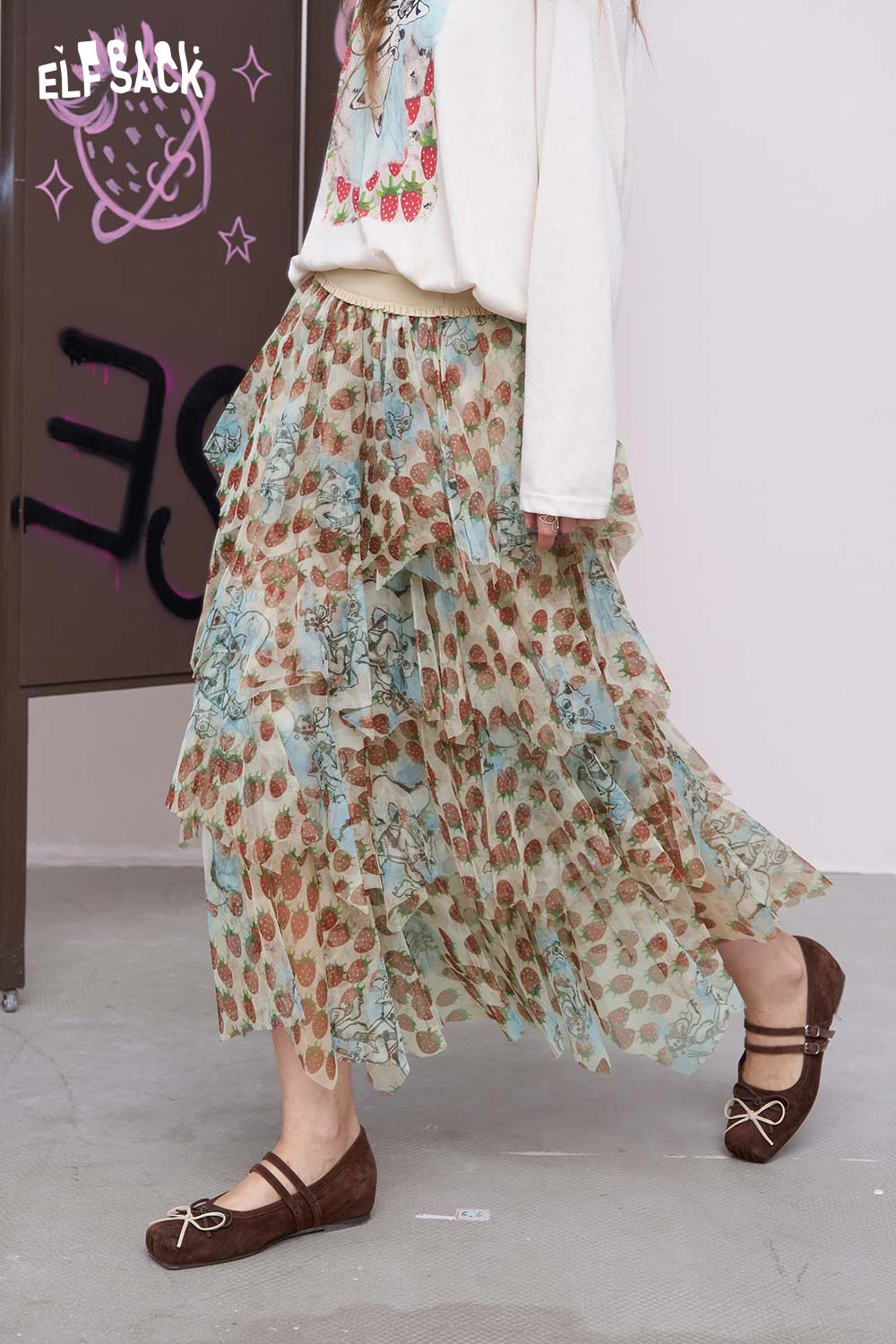 ELFSACK strawberry print chiffon skirt tiered midi ruffle skirt in pastel tones worn with sweater and flats
