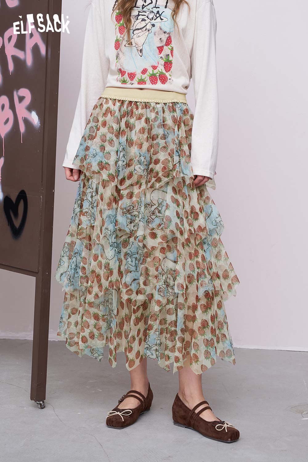 ELFSACK strawberry print chiffon skirt tiered ruffle midi skirt in pastel green worn with sweater and flats