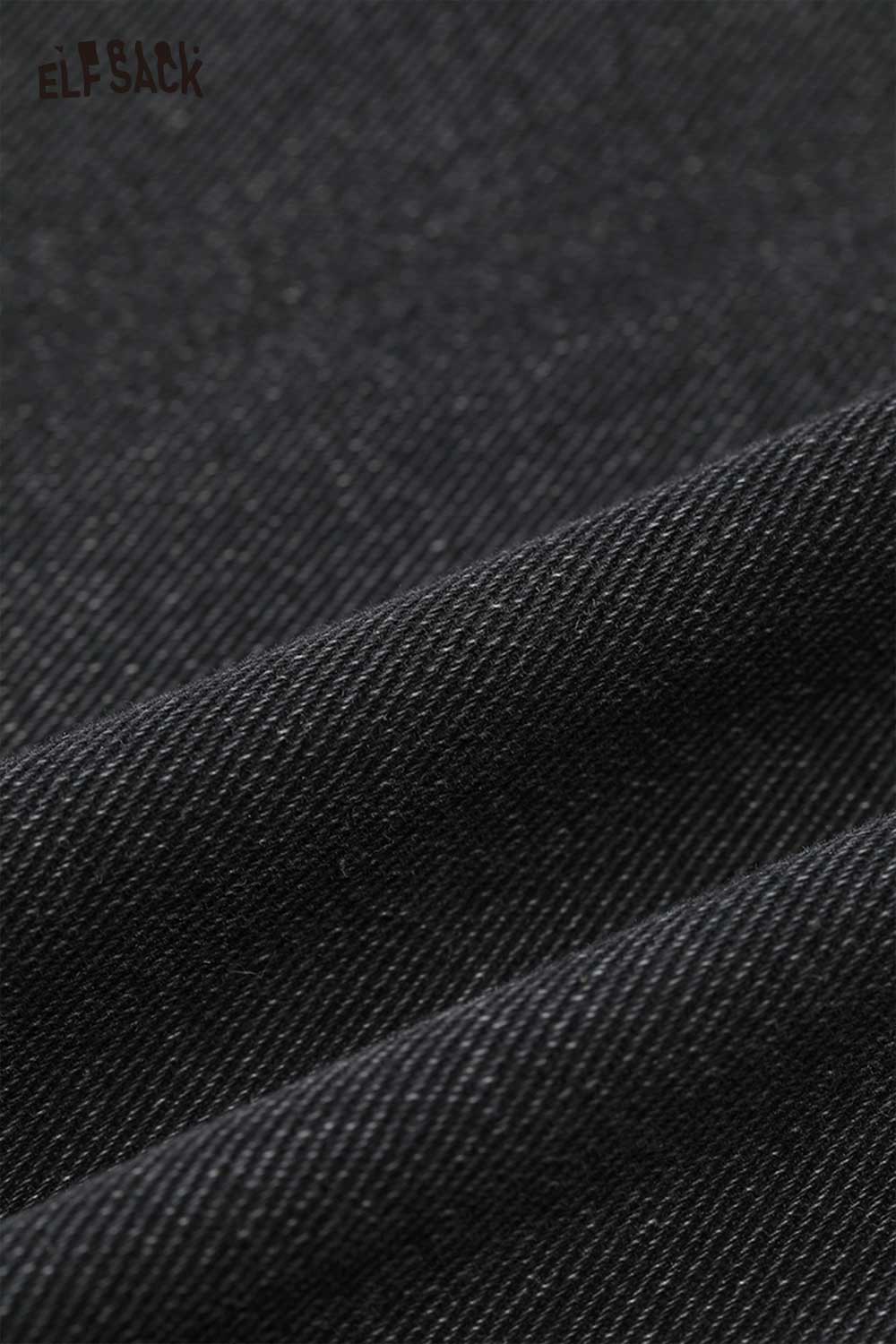 Close-up of ELFSACK loose straight leg graphic jeans fabric showcasing soft, durable material