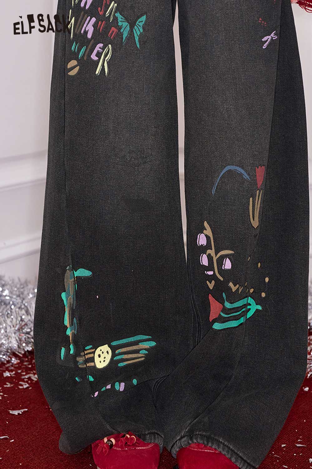 ELFSACK loose straight leg graphic jeans featuring colorful artistic designs for a unique style
