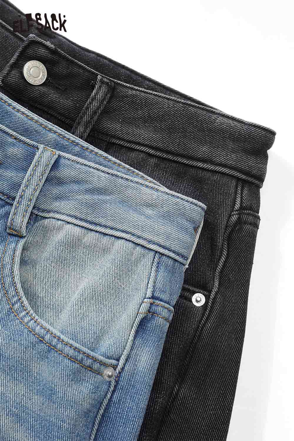 ELFSACK loose straight leg graphic jeans in blue and black showcasing stylish denim details