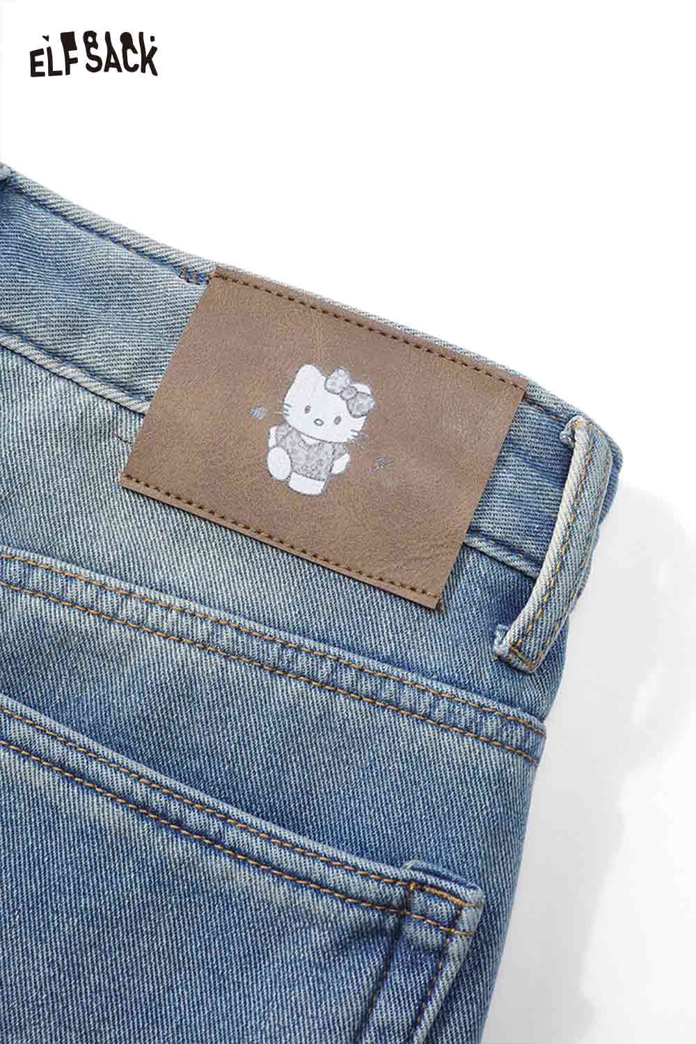 ELFSACK loose straight leg graphic jeans featuring a cute character patch on the back waistband