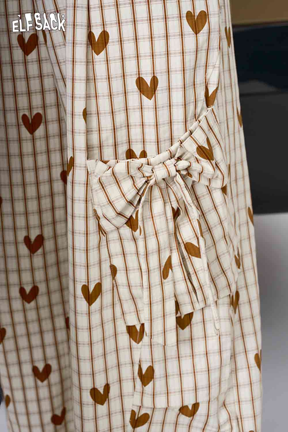 ELFSACK heart plaid wide-leg pants beige plaid with brown heart print side bow tie pocket detail