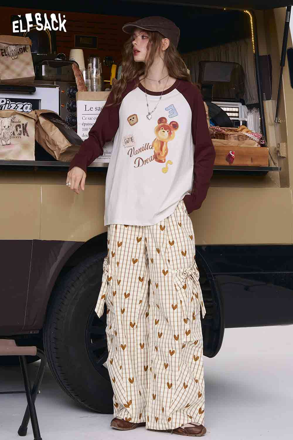 ELFSACK cream striped trousers with brown heart motifs cargo pockets and ruffle ties heart plaid wide-leg pants