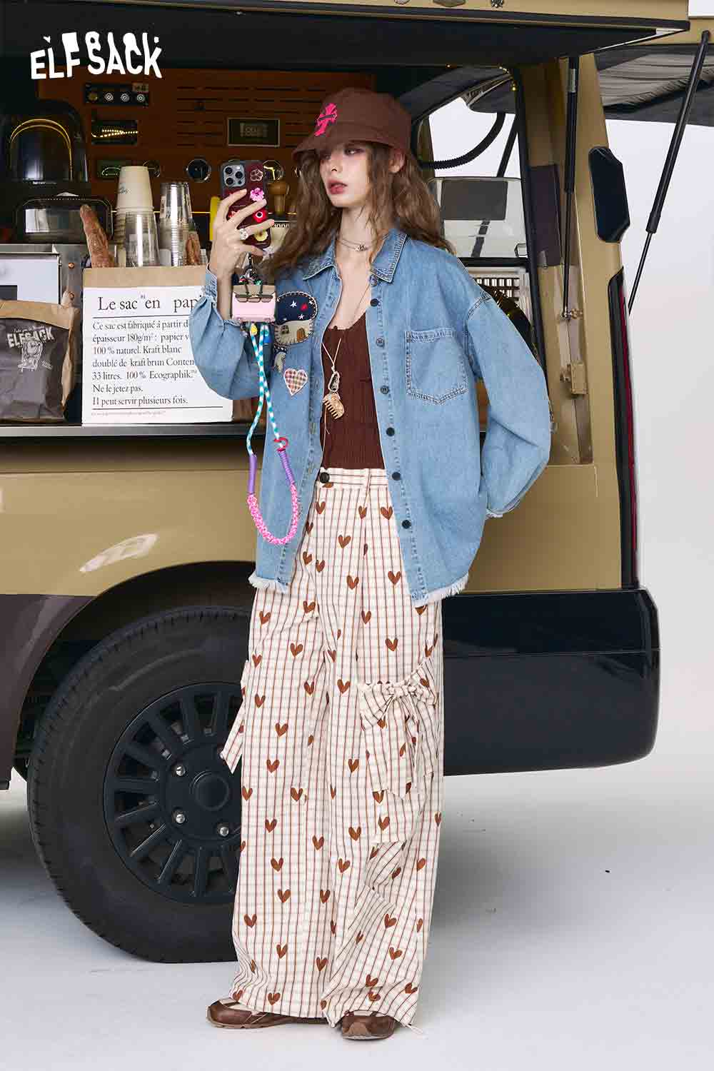 ELFSACK 3D mushroom denim shirt for women styled oversized light blue jacket over brown top and patterned maxi skirt