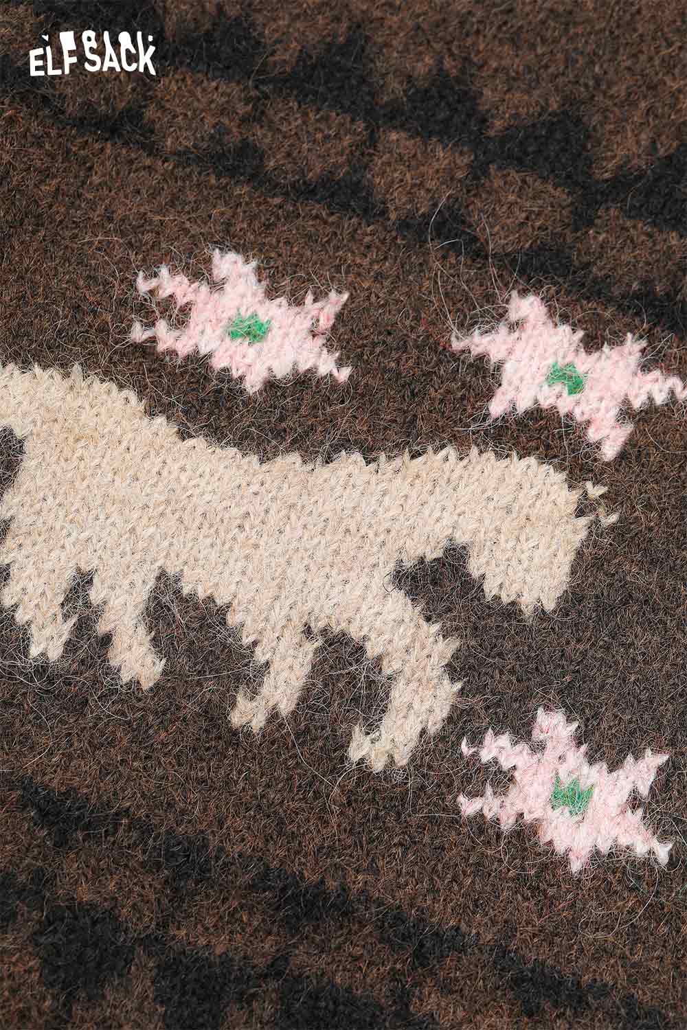 Close-up of ELFSACK minimalist Christmas stripe dress featuring a unique horse and star pattern