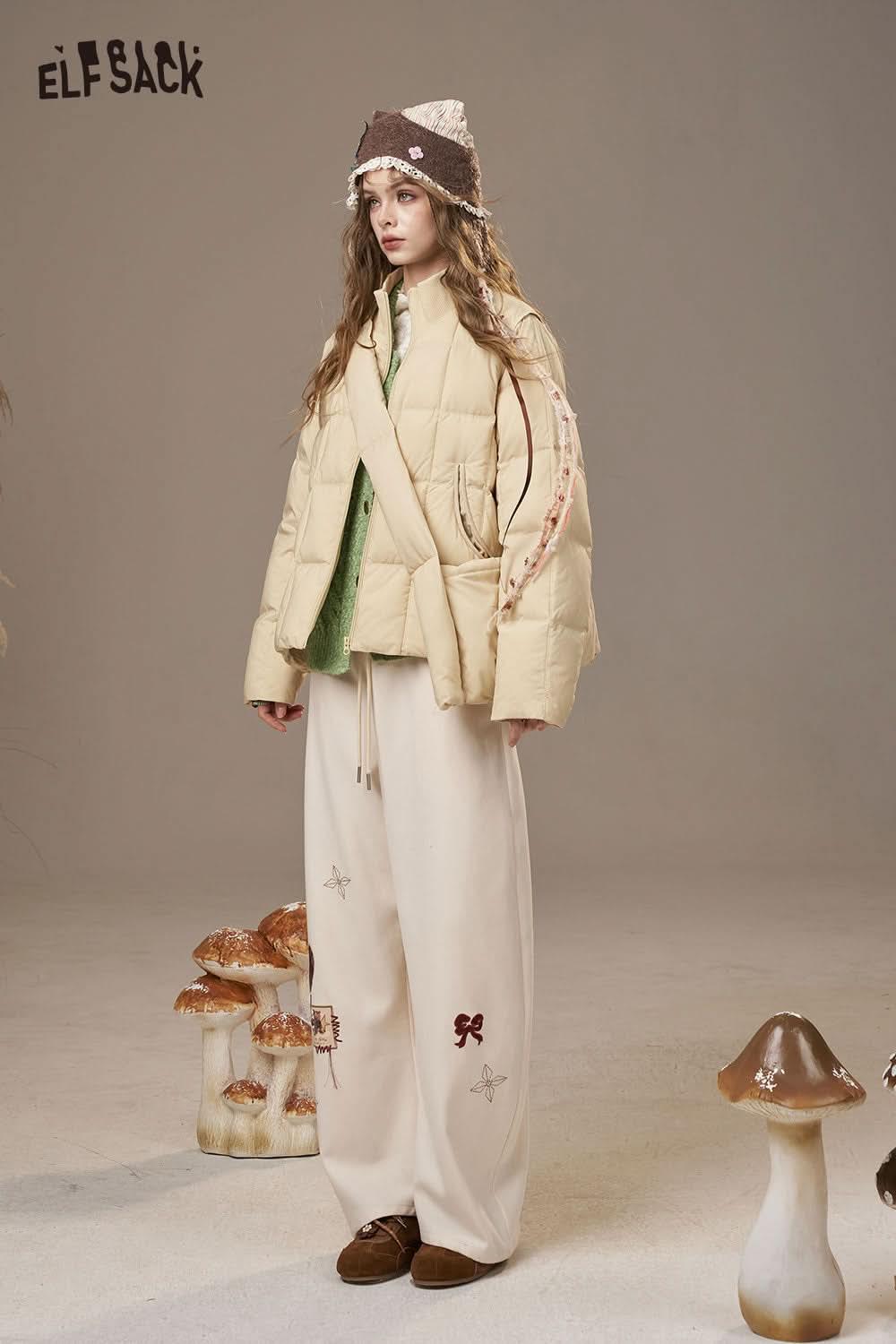 ELFSACK minimalist knit cardigan for women styled with oversized beige puffer jacket and relaxed pants