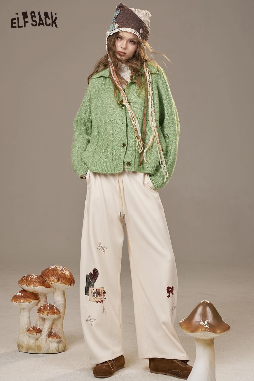 ELFSACK minimalist knit cardigan for women in green paired with beige pants and cozy accessories